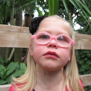 She's all like "Look Mom, isn't this funny!" and I'm all like "Ummm, yea it is!  Let me take a picture and then for pete sake, fix your eyes cause I've paid good money to keep them straight!"